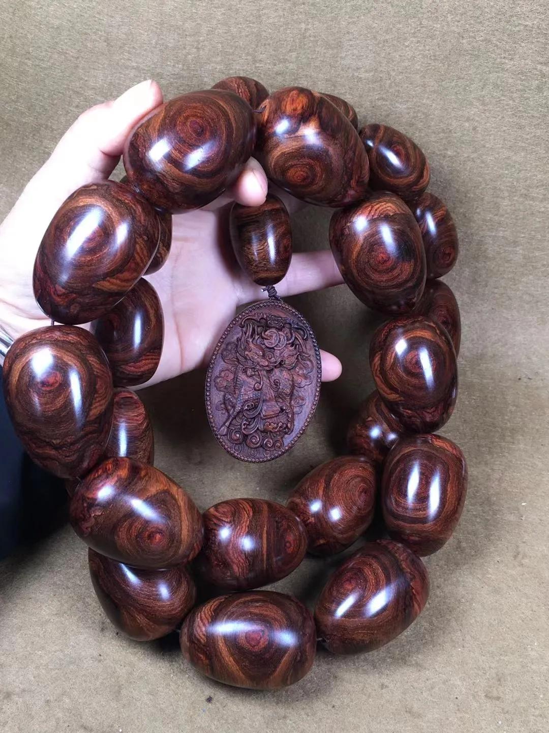 几百块一串的海南黄花梨手串,1.0的108串海南黄花梨手串配饰图片