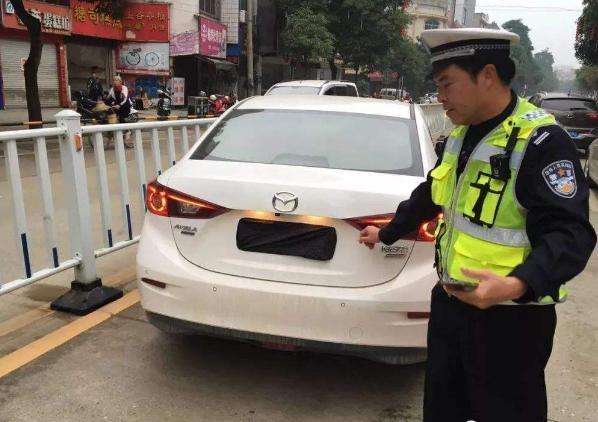 遮挡车牌和不悬挂号牌怎么处罚,车牌被别人恶意遮挡能申诉成功吗