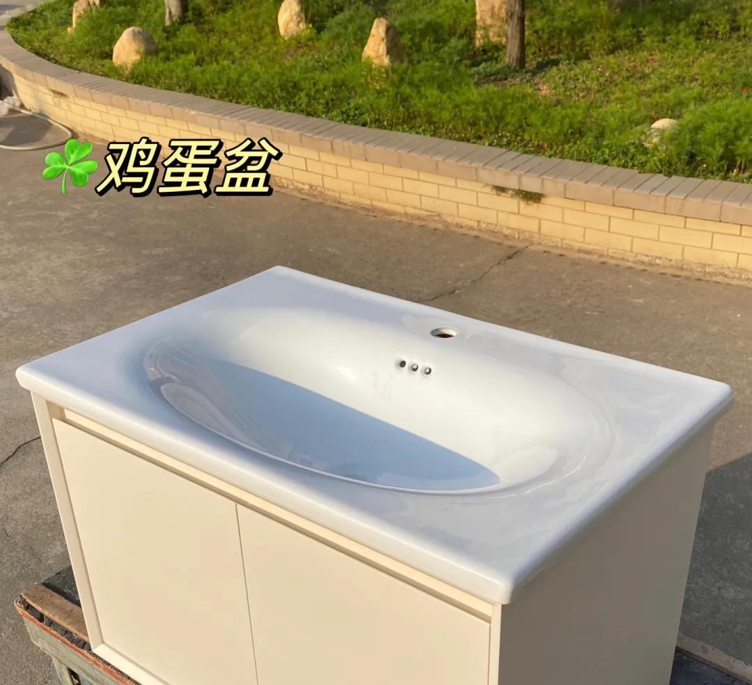 浴室柜一体盆选陶瓷好还是岩板好,浴室柜是用一体陶瓷盆还是大理石