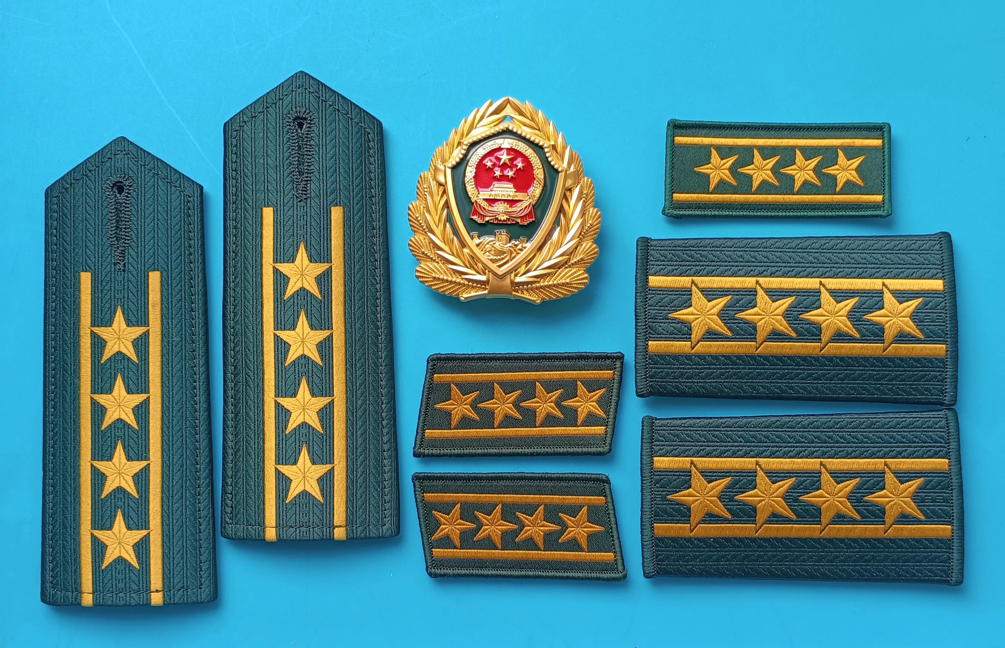 毛启国军装,毛启国警用帽徽