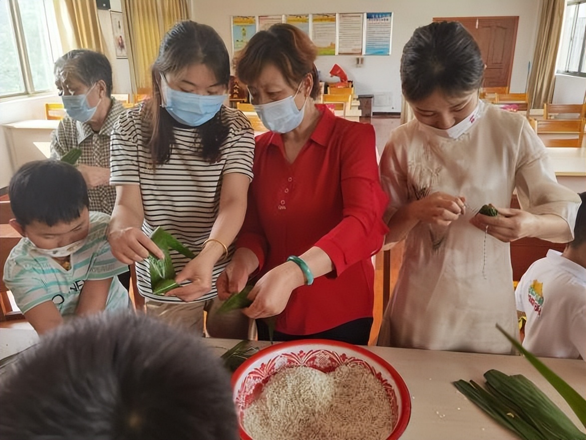 全市组织开展端午节文明实践活动,社区粽叶飘香品味端午活动主题