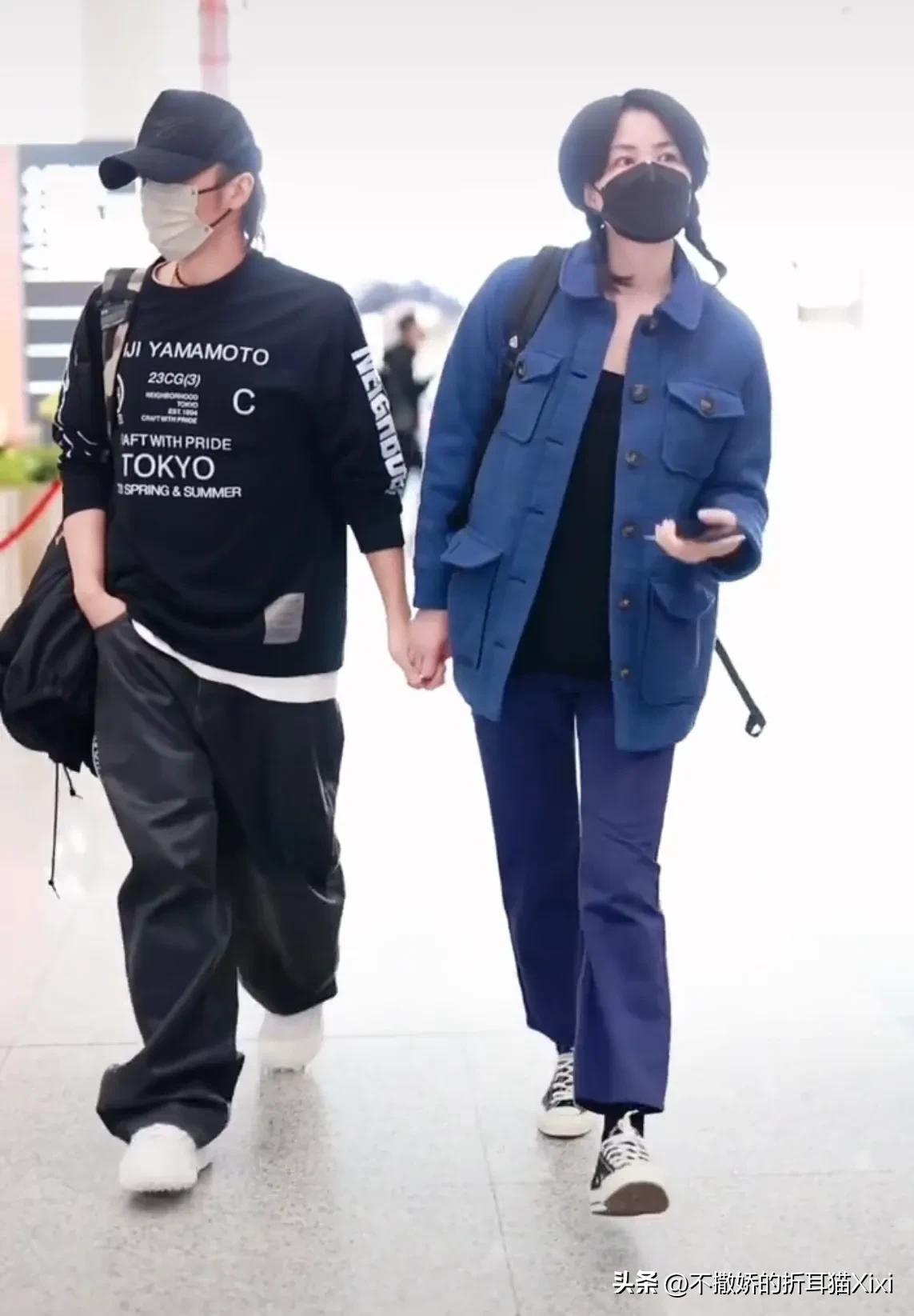 谢霆锋王菲时隔21年再现世纪牵手,王菲谢霆锋机场牵手完整版